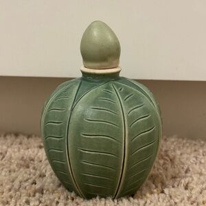 Organic Indonesian ceramic bud vase/ pottery with varigated leaves
